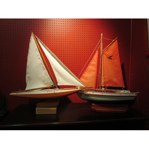 4057 - Two model pond yachts including Seifert, approximately 58cm tall