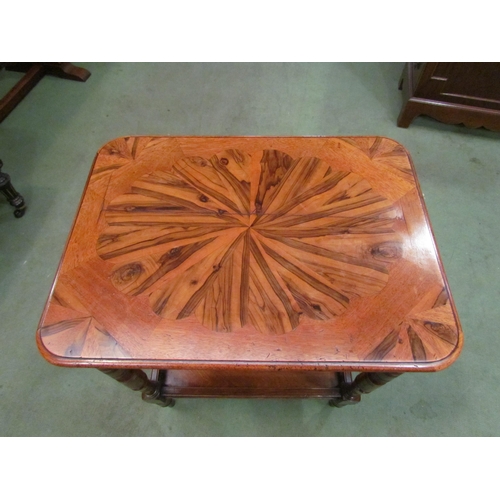 4077 - A Victorian walnut lamp table with exotic wood top over ring-turned tapering legs joined by an under... 