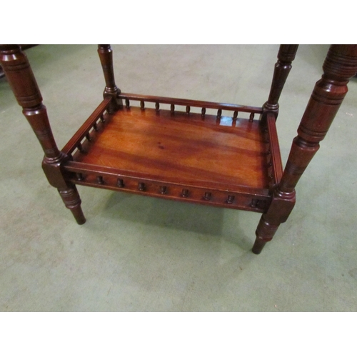 4077 - A Victorian walnut lamp table with exotic wood top over ring-turned tapering legs joined by an under... 