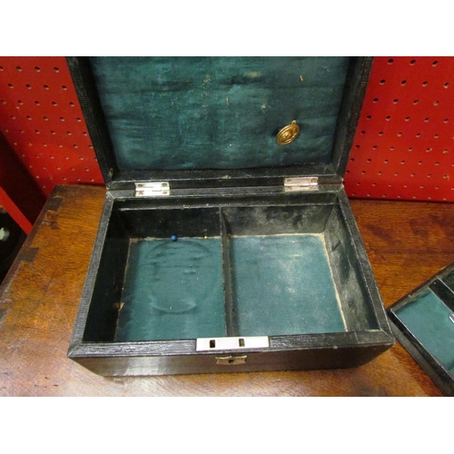 4079 - An early 20th Century leather bound jewellery box with fitted lift-out tray above twin compartments,... 