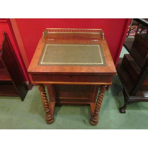 4104 - A mahogany Davenport with brass frieze gallery and gilt tooled leather lift-up top, fitted interior,... 