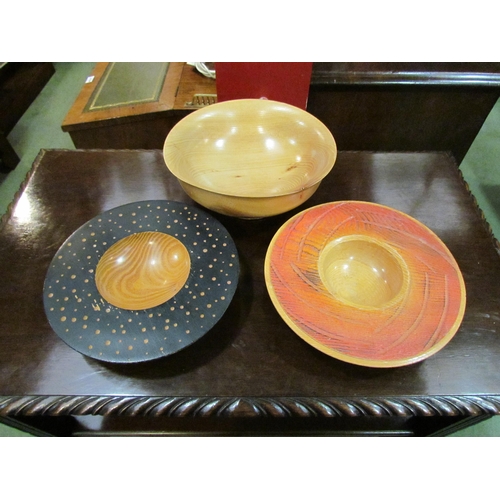 4106 - Three turned wooden bowls.  Largest 24.5cm diameter   (R) £20