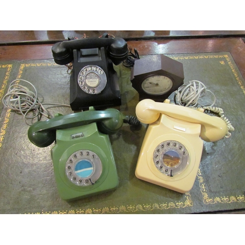 4114 - A black bakelite vintage telephone and two later examples in green and cream, a Ferranti bakelite Ar... 