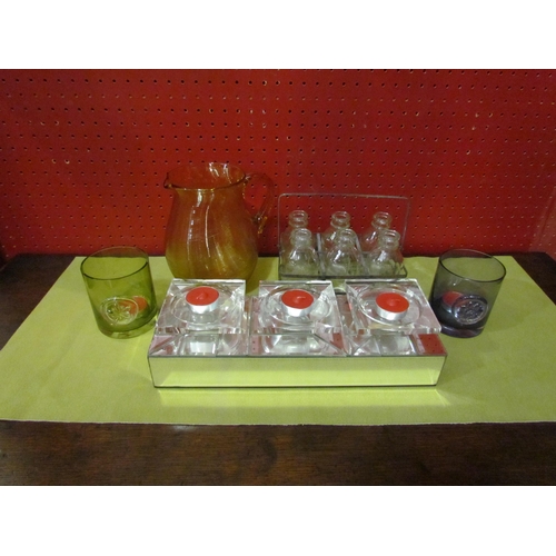 4119 - A yellow ribbed glass jug, Dartington candle holders, rack of bottles and a mirrored trio candle hol... 