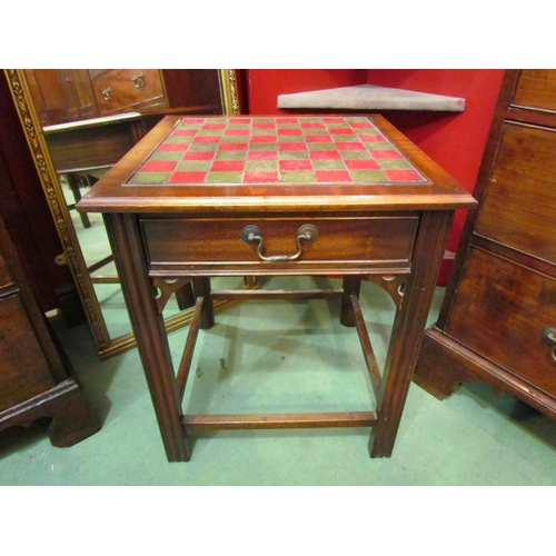 4125 - A mahogany single drawer side table with chess board top, 60cm tall x 51cm squared