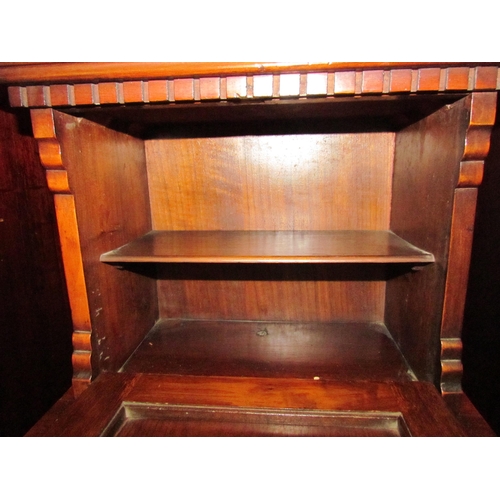 4129 - A 19th Century mahogany purdonium, raised pier top and carved decoration, 98cm tall x 43cm wide x 39... 