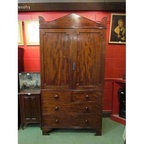 4134 - A Regency mahogany linen press with black line inlay, the two door and three tray interior with key ... 