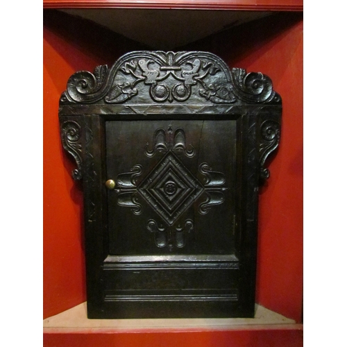 4138 - A 17th Century and later carved oak single door corner cupboard, 70cm tall x 56cm wide     (R) £100