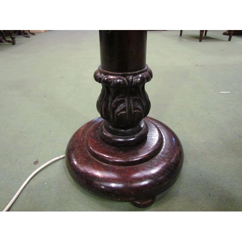 4139 - A stained mahogany and oak lamp base of column form, 83cm tall