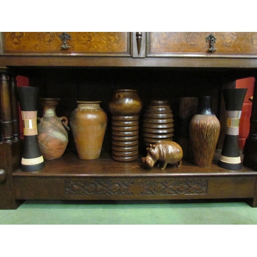 4144 - A collection of wooden vases, pots, hippo figure etc.