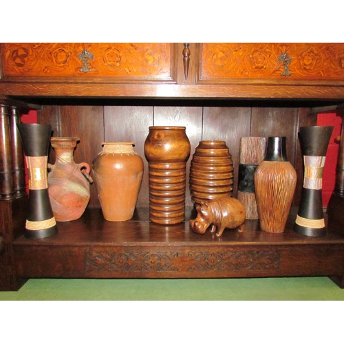 4144 - A collection of wooden vases, pots, hippo figure etc.