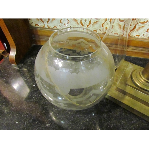 4158 - A Victorian brass oil lamp, the frosted globular glass shade (a/f) over a cut glass reservoir to a b... 