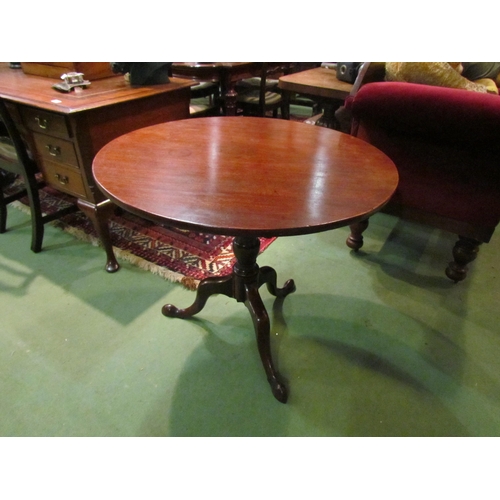 4161 - A George III mahogany circular tilt-top wine table on turned column and tripod base, 71cm tall x 84c... 