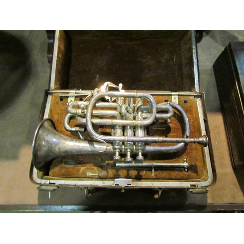 4194 - A Hawkes & Son 'The Clippertone' silver plated cornet in original case, incomplete