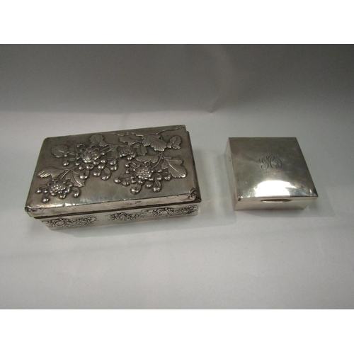 4329 - A silver cigar box, monogrammed, together with an Oriental floral design box