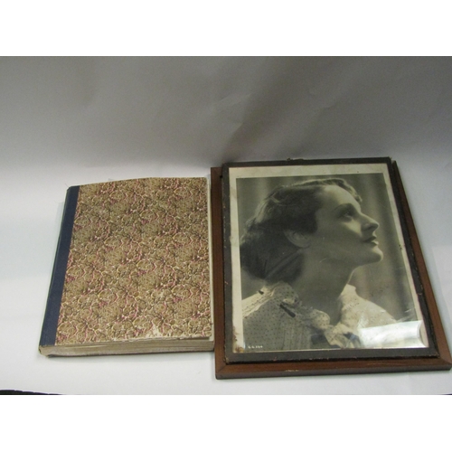 4332 - A photograph album containing images of film stars with autographs and a photograph indistinctly sig... 