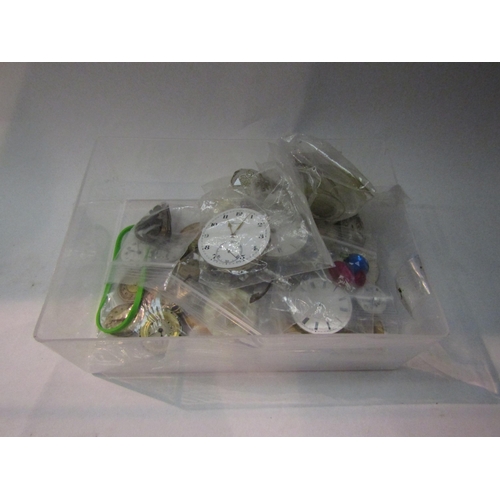 4343 - A tub containing a quantity of watch parts and assorted items