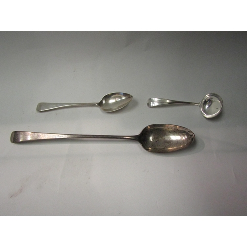 4347 - A sterling silver sauce ladle, George III silver spoon and basting spoon, marks indistinguishable