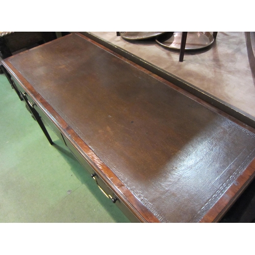 4199 - A Georgian mahogany writing table, the tooled edge writing surface over two frieze drawers on square... 