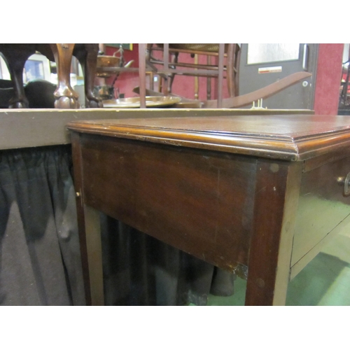 4199 - A Georgian mahogany writing table, the tooled edge writing surface over two frieze drawers on square... 