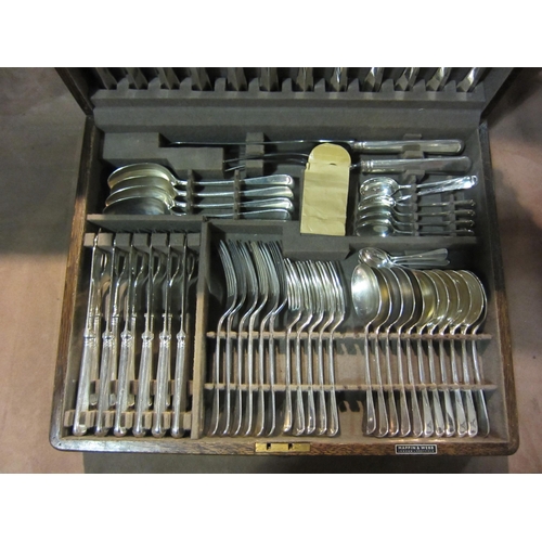 4215 - A Mappin & Webb canteen of cutlery in oak case with key