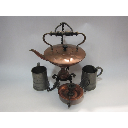 4225 - A copper spirit burning kettle, candle holder and two Victorian pewter tankards, one a/f (4)