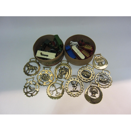 4273 - A small quantity of horse brasses and a small collection of diecast vehicles