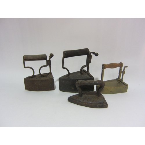 4286 - Four vintage salesman's irons of small proportions including brass         (R) £20