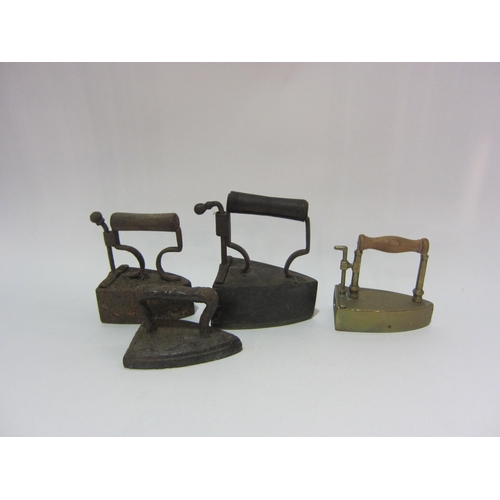 4286 - Four vintage salesman's irons of small proportions including brass         (R) £20