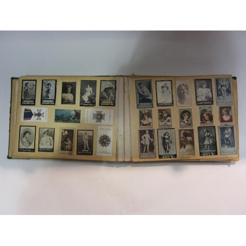 4298 - Three albums containing mainly Victorian scrapbook contents and various cigarette cards