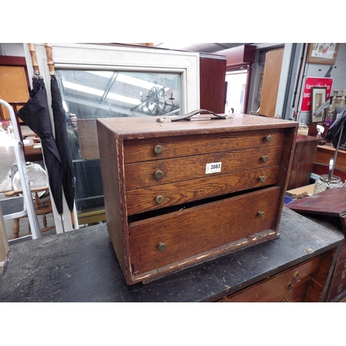 2083 - An oak engineers tool chest with fitted interior and contents