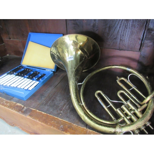 2253 - A Vintage brass French Horn, Cornet & Xylaphone