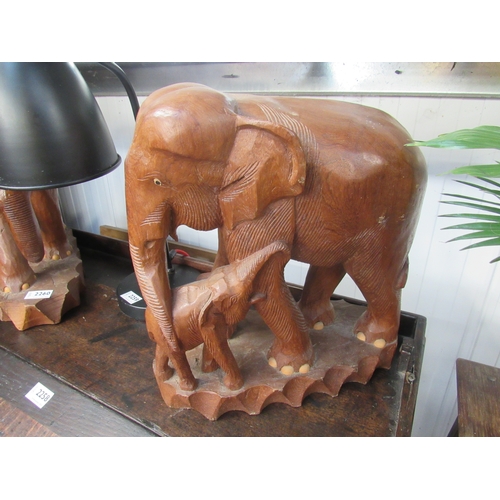 2260 - A pair of carved elephant figures