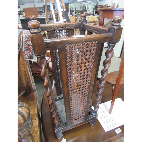 2461 - An Edwardian mahogany lamp table together with a 1920's oak barleytwist and bergere umbrella and sti... 