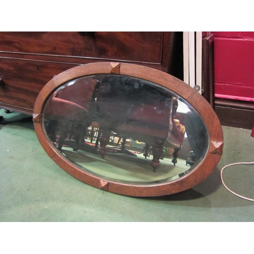 4151 - An oak bevel edged wall mirror and one other (2)        (E) £10-15