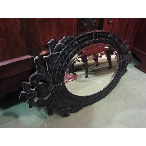 4151 - An oak bevel edged wall mirror and one other (2)        (E) £10-15