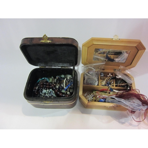 4391 - Two Jewellery boxes containing bijouterie including pendants on ribbons, loose beads, earrings rings... 