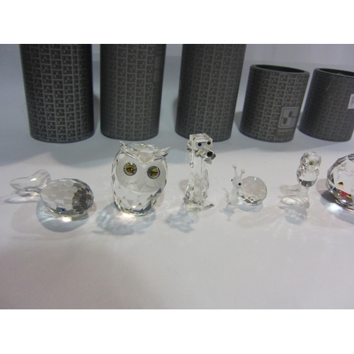 4412 - A collection of Swarovski Crystal; owl on branch, snail, whale, owl, dog, etc (7)