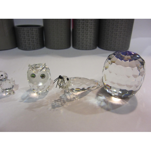 4414 - A collection of Swarovski crystal; owl, duck, small butterfly and rabbit, seal, bird's nest mother a... 