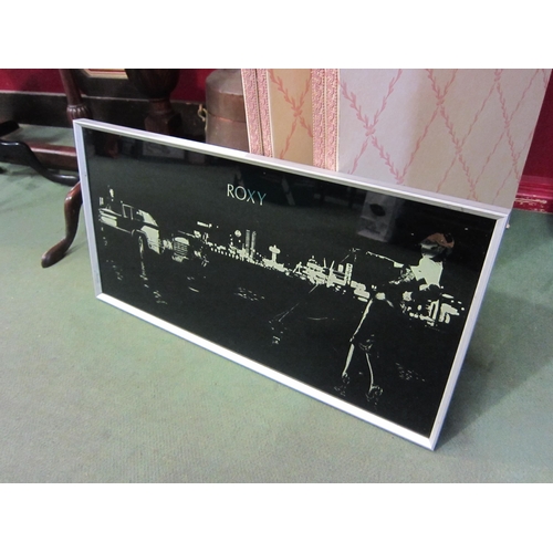 4431 - A Roxy Music advertising mirror, framed, 31cm x 61cm total