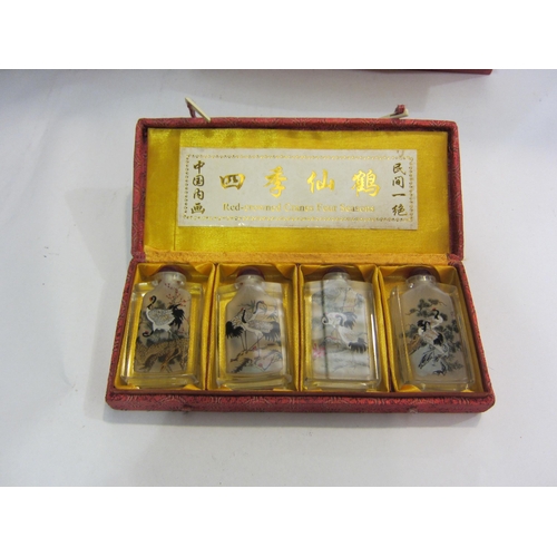 4437 - A collection of Oriental items; chopsticks in inlaid mother-of-pearl box, small screen, figures, etc