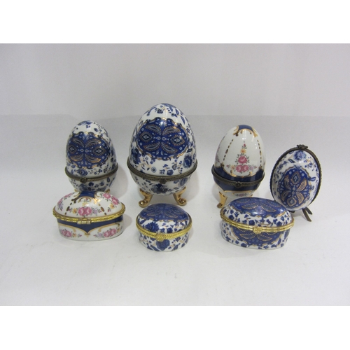 4438 - A small collection of four porcelain eggs on tripod legs, one containing a scent bottle, together wi... 