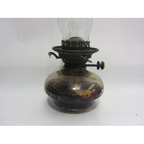 4445 - Two oil lamps with Griffin chimneys, one with a Vaseline base