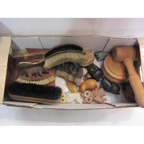 4450 - A box of assorted items including carved wooden owls, hand brushes, malachite, oversized gavel, etc ... 