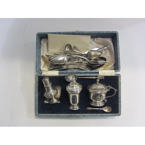 4455 - A quantity of Georgian and later silver and while metal spoons together with three cruets, one non-m... 