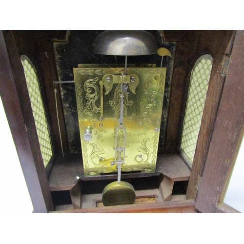 8068 - A Georgian mahogany bracket clock, Baker Tamworth, with arch white dial and Roman numerals, also out... 