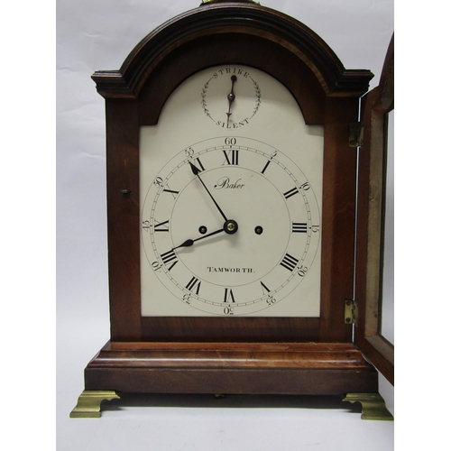 8068 - A Georgian mahogany bracket clock, Baker Tamworth, with arch white dial and Roman numerals, also out... 