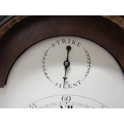 8068 - A Georgian mahogany bracket clock, Baker Tamworth, with arch white dial and Roman numerals, also out... 