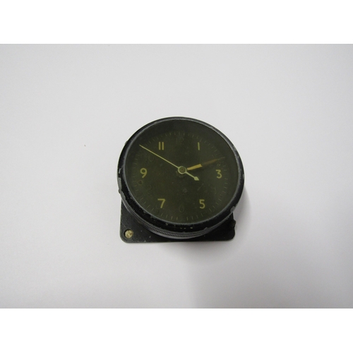 8112 - An original WWII aircraft 'one day' cockpit clock, Mk.11A 6A/1002. Metal alloy case with black circu... 