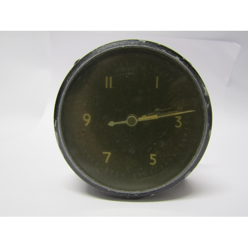 8112 - An original WWII aircraft 'one day' cockpit clock, Mk.11A 6A/1002. Metal alloy case with black circu... 